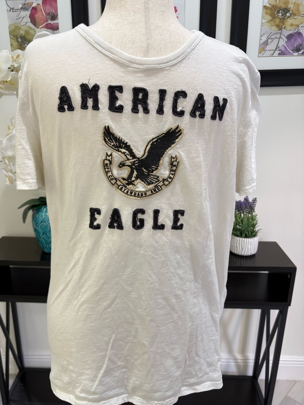 American Eagle Outfitters White Tee with Black & Gold Eagle Patch